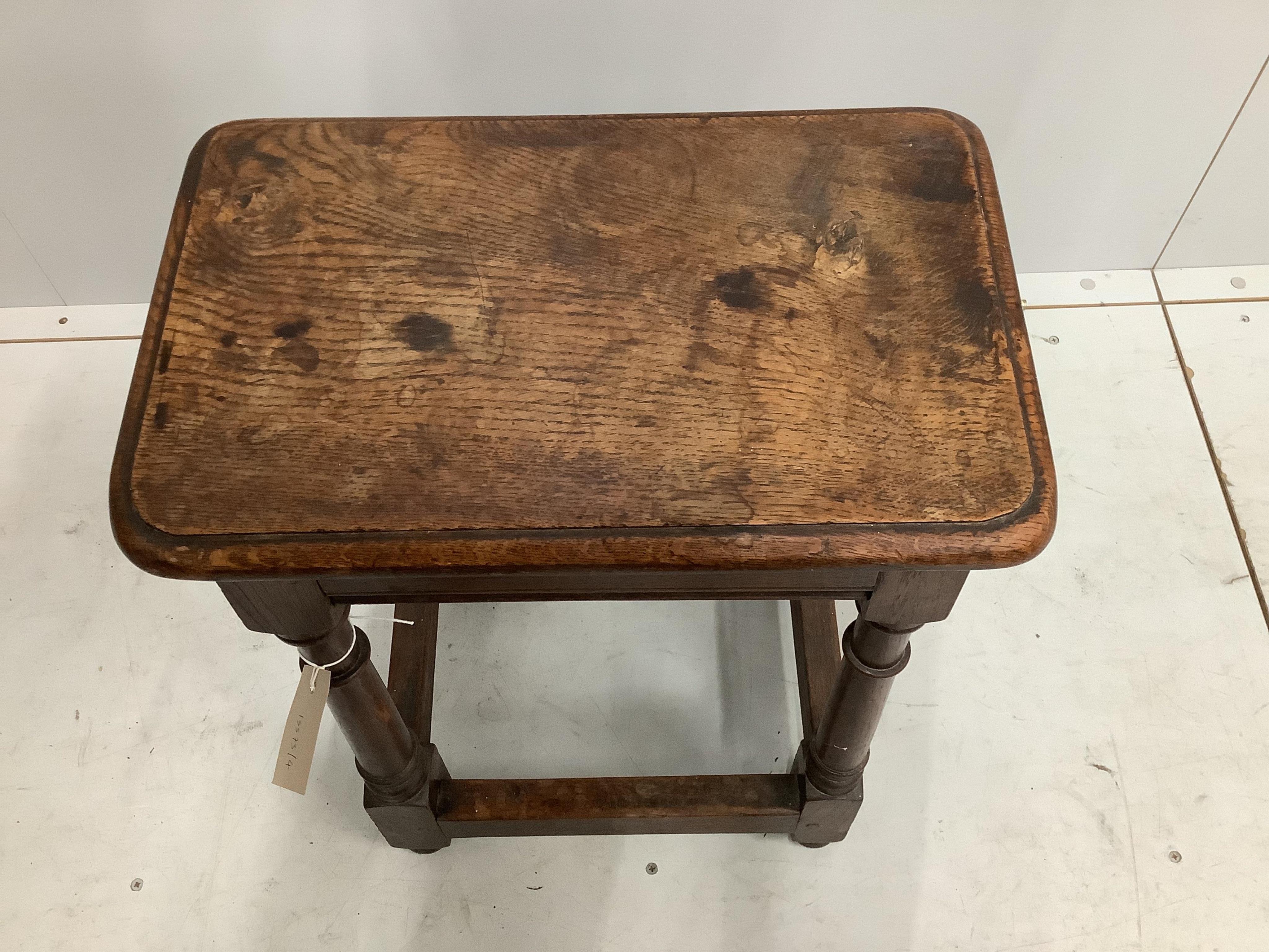 A 17th century style oak joint stool, width 45cm, height 56cm. Condition - fair to good